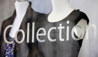 STORE MAGASIN ET ADHESIF VITRINE A NANCY